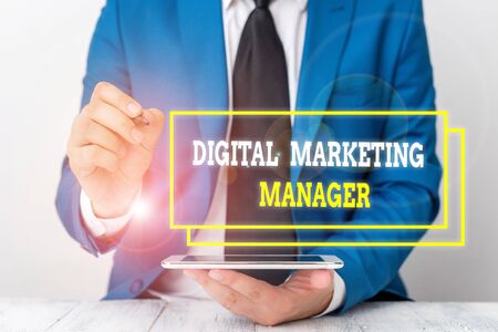 Conceptual hand writing showing Digital Marketing Manager. Concept meaning optimized for posting in online boards or careers Businessman pointing with pen in empty copy spaceの写真素材