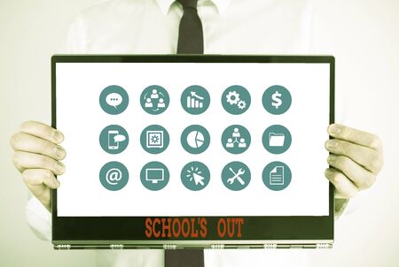 Handwriting text School S Is Out. Conceptual photo classes are over for the time being End of the school day Male human holding thick textured cardboard of business promotion conceptの写真素材