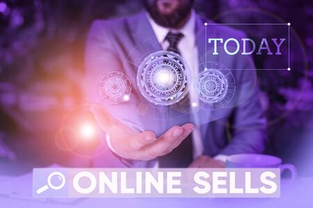 Word writing text Online Sells. Business photo showcasing sellers directly sell goods or services over the Internet Male human wear formal work suit presenting presentation using smart deviceの写真素材