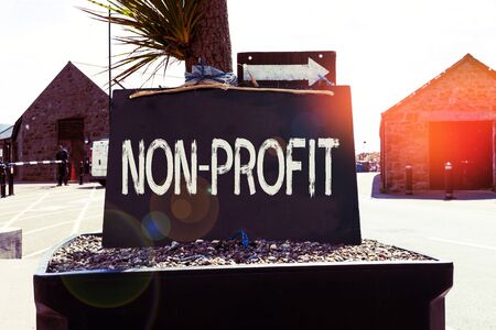 Text sign showing Non Profit. Business photo showcasing type of organization that does not earn...