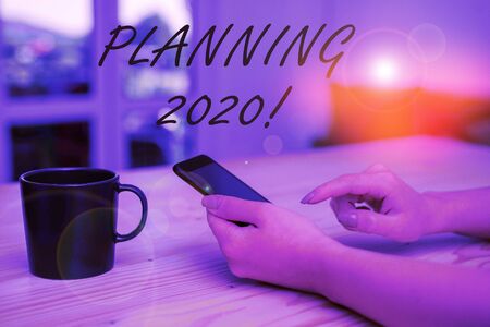 Conceptual hand writing showing Planning 2020. Concept meaning process of making plans for something...