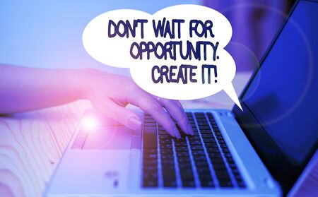 Writing note showing Don T Wait For Opportunity Create It. Business concept for work hard on yourself and begin from this moment woman with laptop smartphone and office supplies technologyの写真素材