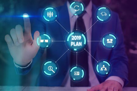 Text sign showing 2019 Plan. Business photo text setting up your goals and plans for the current year or in 2019 Picture photo system network scheme modern technology smart deviceの写真素材