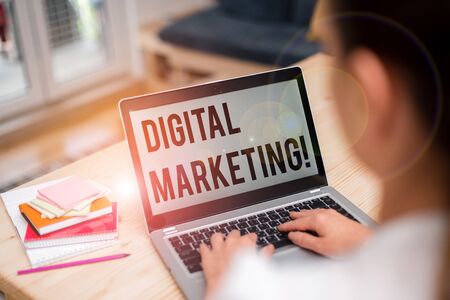 Text sign showing Digital Marketing. Business photo showcasing market products or services using technologies on Internet woman laptop computer office supplies technological devices inside homeの写真素材