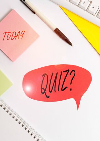Word writing text Quiz Question. Business photo showcasing test of knowledge as competition between individuals or teams Red bubble copy space paper on the tableの写真素材