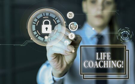 Text sign showing Life Coaching. Business photo showcasing demonstrating employed to help showing attain their goals in career Woman wear formal work suit present presentation using smart latest deviceの写真素材