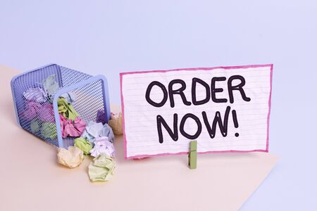 Conceptual hand writing showing Order Now. Concept meaning confirmed request by one party to another to buy sell Trash bin crumpled paper clothespin reminder office supplies