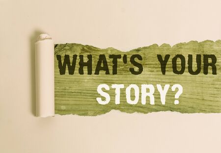 Writing note showing What S Is Your Story question. Business concept for being asked by someone about my own journey from beginning till now Cardboard which is torn placed above a wooden classic tableの写真素材