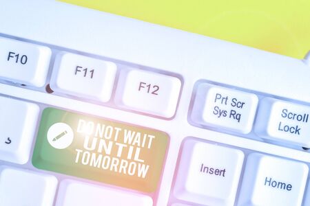 Word writing text Do Not Wait Until Tomorrow. Business photo showcasing needed to do it right away Urgent Better do now White pc keyboard with empty note paper above white background key copy spaceの写真素材