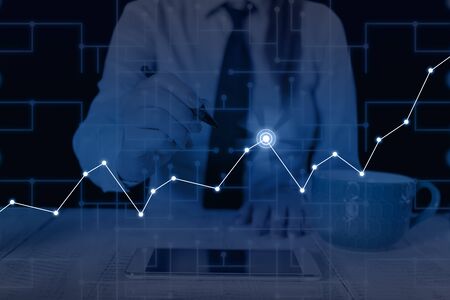 Woman wear formal work suit present presentation using smart latest deviceの写真素材