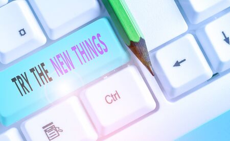 Handwriting text Try The New Things. Conceptual photo Breaks up Life Routine Learn some Innovative Skillsの写真素材