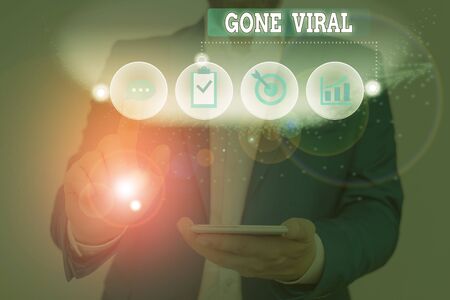 Text sign showing Gone Viral. Business photo text link that spreads rapidly through a population by sharingの写真素材