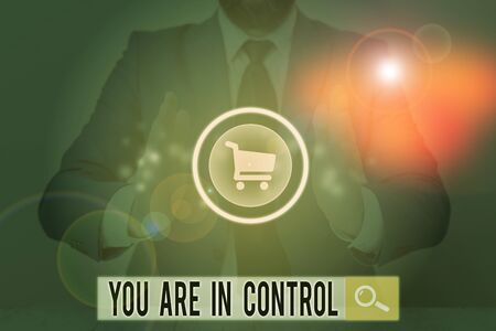 Writing note showing You Are In Control. Business concept for Responsibility over a situation Management authorityの写真素材