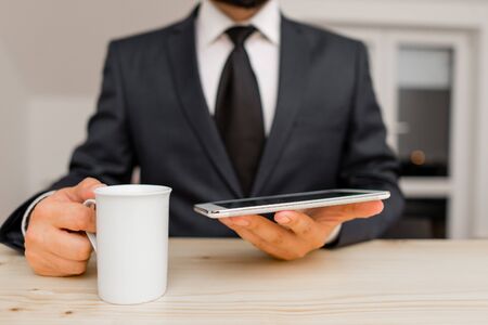 Male human wear formal clothes present presentation use hi tech smartphone