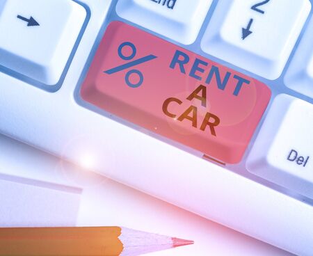 Conceptual hand writing showing Rent A Car. Concept meaning paying for temporary vehicle usage from one day to monthsの写真素材