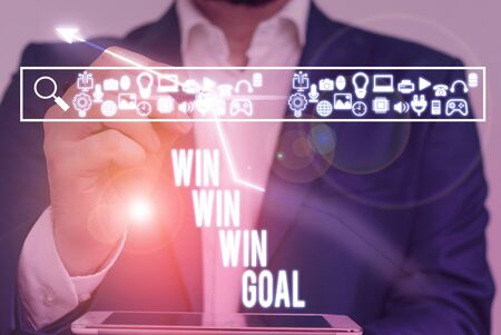 Writing note showing Win Win Win Goal. Business concept for Approach that aims to satisfy all parties involvedの写真素材