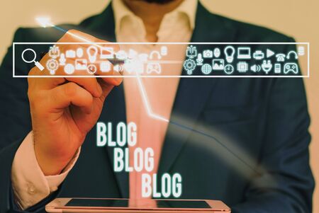 Writing note showing Blog Blog Blog. Business concept for Internet blogging trend modern virtual communicationの写真素材