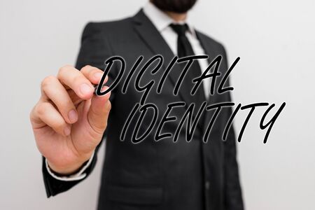 Writing note showing Digital Identity. Business concept for networked identity adopted or claimed in cyberspace Male human with beard wear formal working suit clothes handの写真素材