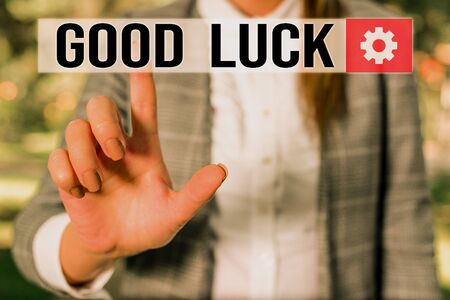 Text sign showing Good Luck. Business photo showcasing wish positive fortune or happy outcome that a demonstrating can have Business woman in the nature pointing with the finger into empty space