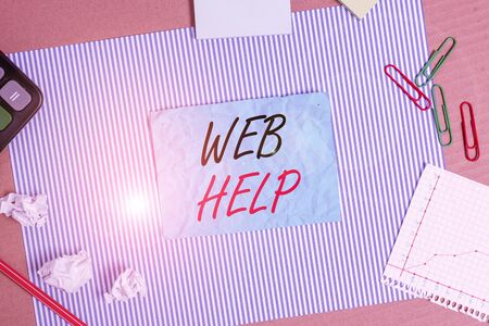 Handwriting text Web Help. Conceptual photo procedural or reference information delivered through computer Striped paperboard notebook cardboard office study supplies chart paperの写真素材