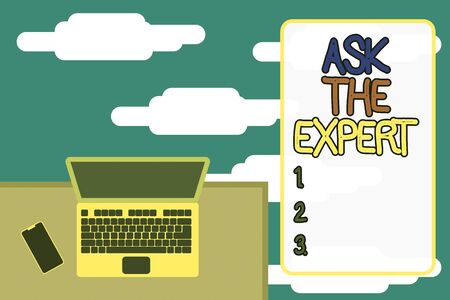 Word writing text Ask The Expert. Business photo showcasing Looking for professional advice Request Help Support Upper view office working place laptop lying wooden desk smartphone sideの写真素材