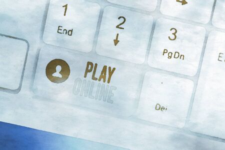 Writing note showing Play Online. Business concept for a video game played over some form of...