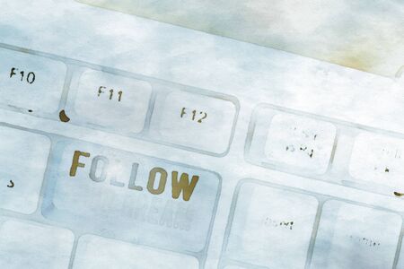 Conceptual hand writing showing Follow Your Dream. Concept meaning Keep track on your goals Live the life you want to be White pc keyboard with note paper above the white backgroundの写真素材