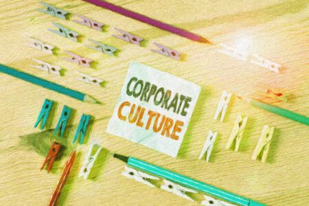 Word writing text Corporate Culture. Business photo showcasing pervasive values and attitudes that characterize a company Colored clothespin papers empty reminder wooden floor background officeの写真素材