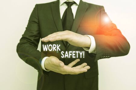 Handwriting text writing Work Safety. Conceptual photo policies and procedures in place to ensure health of employees Male human with beard wear formal working suit clothes raising one hand upの写真素材
