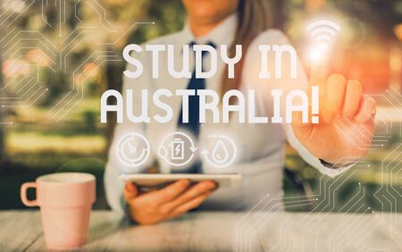Conceptual hand writing showing Study In Australia. Concept meaning going into foreign country order complete your studiesの写真素材