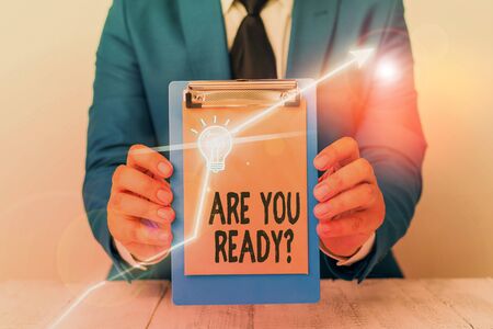 Writing note showing Are You Ready Question. Business concept for used telling someone start something when feel preparedの写真素材