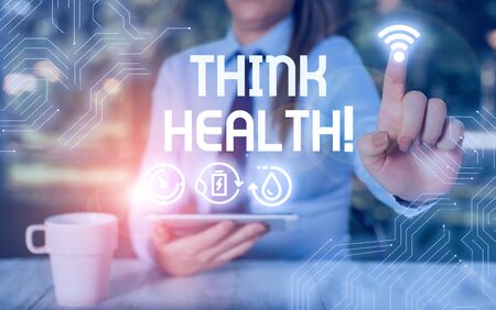 Conceptual hand writing showing Think Health. Concept meaning state of complete physical mental and social well beingの写真素材