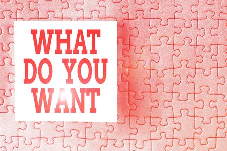 Text sign showing What Do You Want. Business photo showcasing used for offering something to someone or asking their need Piece of square note paper use for give notation stick to puzzle backgroundの写真素材
