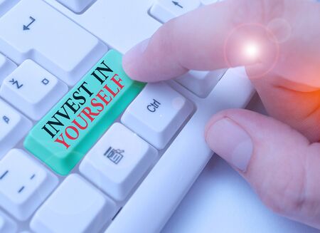 Text sign showing Invest In Yourself. Business photo text learn new things or materials thus making your lot betterの写真素材