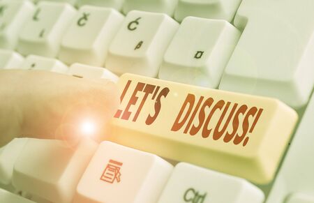 Writing note showing Let S Discuss. Business concept for asking someone to talk about something with demonstrating or showingの写真素材