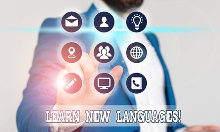 Conceptual hand writing showing Learn New Languages. Concept meaning developing ability to communicate in foreign langの写真素材