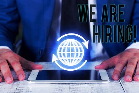 Writing note showing We Are Hiring. Business concept for recently you employ someone or pay someone to do particular jobの写真素材