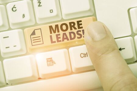 Writing note showing More Leads. Business concept for initiation of consumer interest or enquiry...