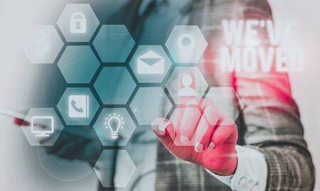 Writing note showing We Ve Moved. Business concept for To go from one residence or location to another Relocateの写真素材