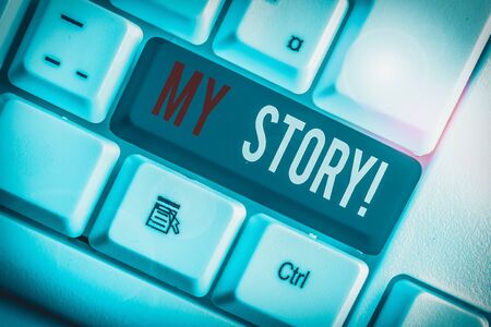 Writing note showing My Story. Business concept for your past life events actions or choices you made White pc keyboard with note paper above the white backgroundの写真素材