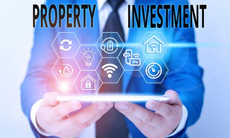 Word writing text Property Investment. Business photo showcasing Asset purchased and held primarily for its future incomeの写真素材
