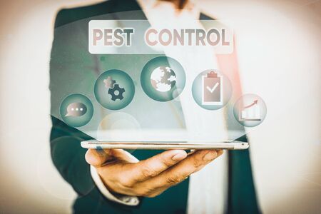 Writing note showing Pest Control. Business concept for analysisagement of a species that impacts...