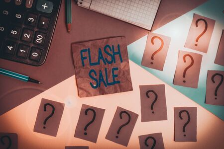 Handwriting text Flash Sale. Conceptual photo a sale of goods at greatly reduced prices at a short period Mathematics stuff and writing equipment above pastel colours backgroundの写真素材