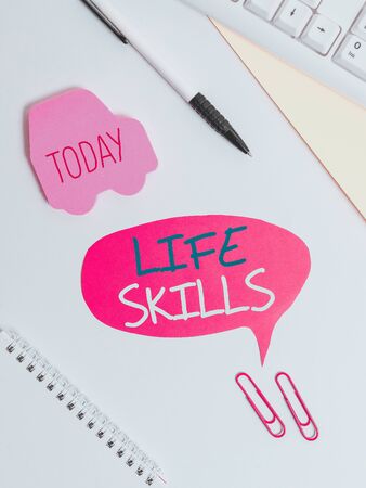 Text sign showing Life Skills. Business photo showcasing skill that is necessary for full participation in everyday life Red bubble copy space paper on the table with clockの写真素材
