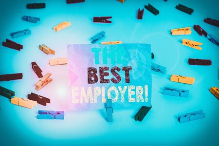 Writing note showing The Best Employer. Business concept for created workplace showing feel heard and empowered Colored clothespin papers empty reminder white floor background officeの写真素材