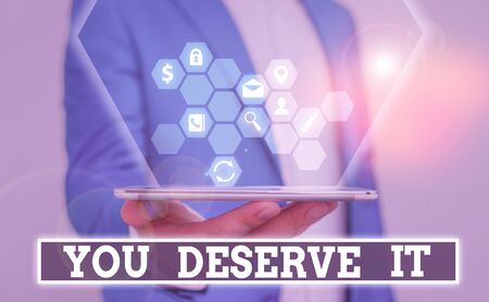 Writing note showing You Deserve It. Business concept for Reward for something well done Deserve Recognition awardの写真素材