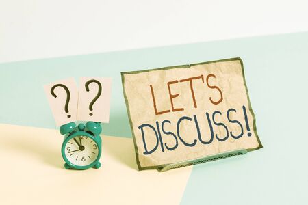 Writing note showing Let S Discuss. Business concept for asking someone to talk about something with...