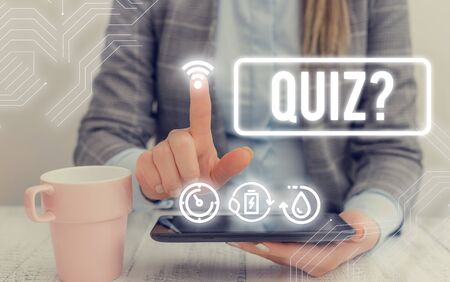 Text sign showing Quiz Question. Business photo text test of knowledge as competition between individuals or teamsの写真素材