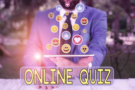 Handwriting text writing Online Quiz. Conceptual photo game or a mind sport that are published on the Internetの写真素材