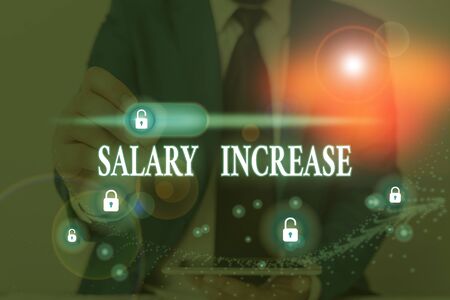 Writing note showing Salary Increase. Business concept for an increase in the salary or pay given to an employeeの写真素材